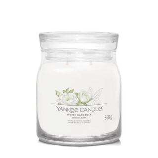 Candela profumata Yankee Candle White Gardenia in giara media da 368 g. Fragranza fiorita con note di gardenia e gelsomino; combustione uniforme...
