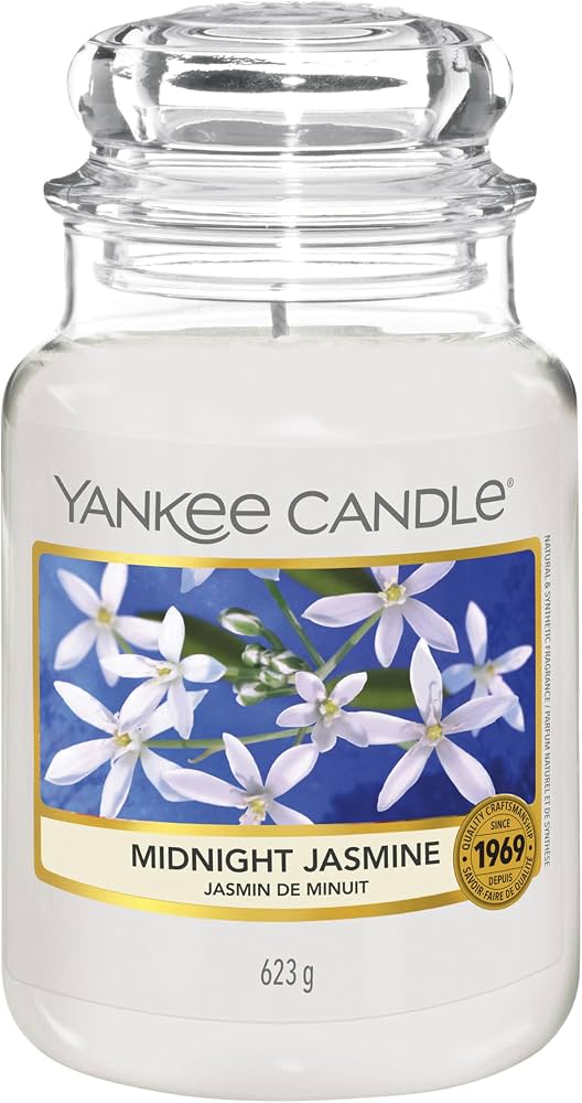 YANKEE CANDLE CAR JAR PAPER MIDNIGHT JASMINE Profumatore sospeso per auto Yankee Candle nella fragranza Midnight Jasmine. Formato singolo paper da 12 g, ideale per rinfrescare abitacoli e...